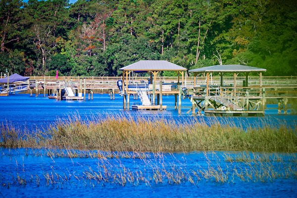 Boat docks on edge of water